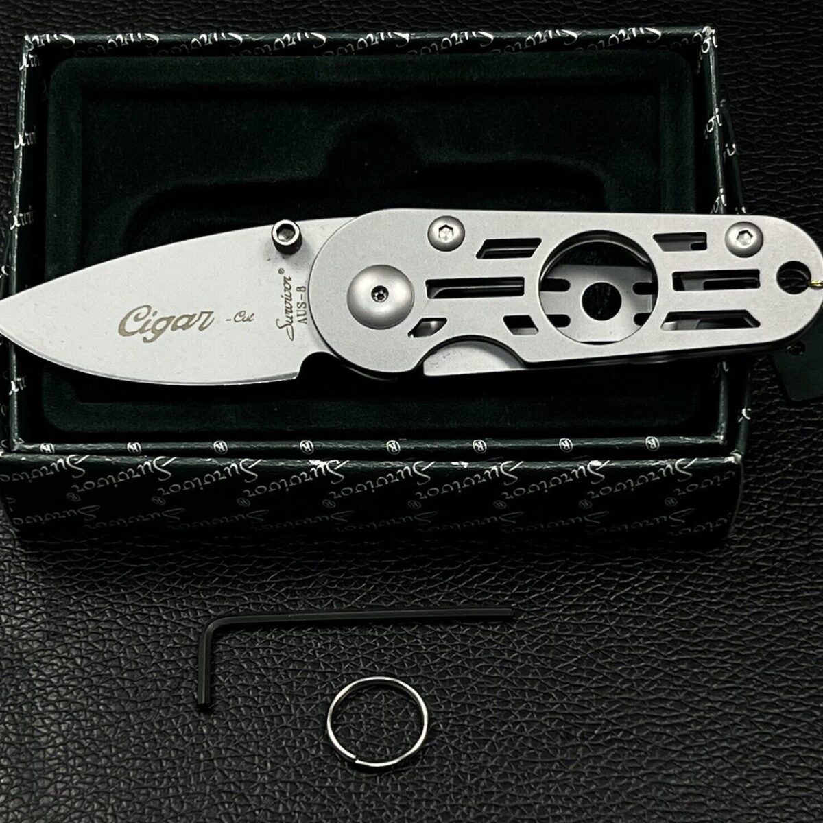 Cigar-cut1 - the survivor cigar cutter/pocket knife serves not only as a nice cutting tool - cigar cut1